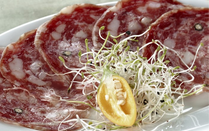Sliced Salami with Sprouts and Pepper