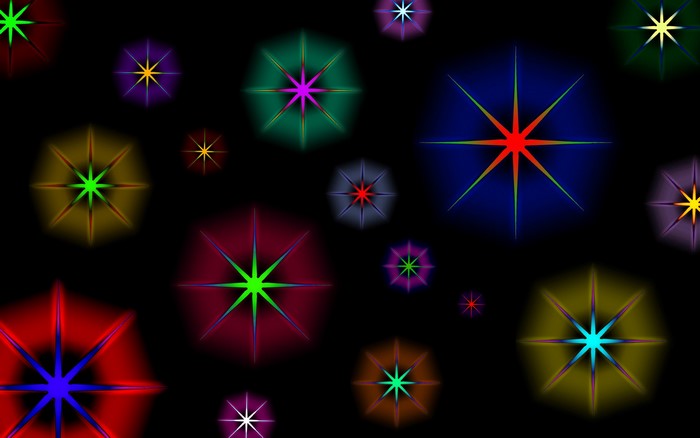 Abstract colorful starbursts on black background