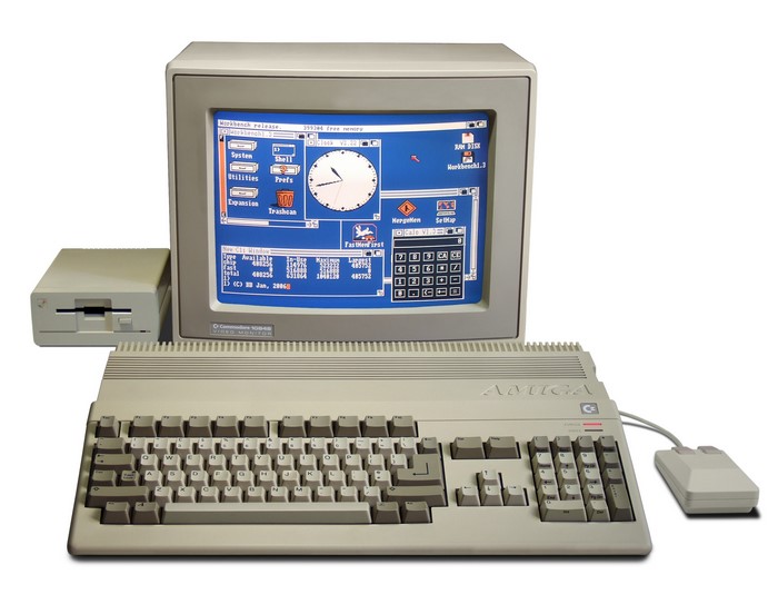 Commodore Amiga 500 computer with monitor, floppy drive, and mouse