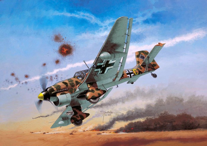 German Stuka dive bomber in flight during combat