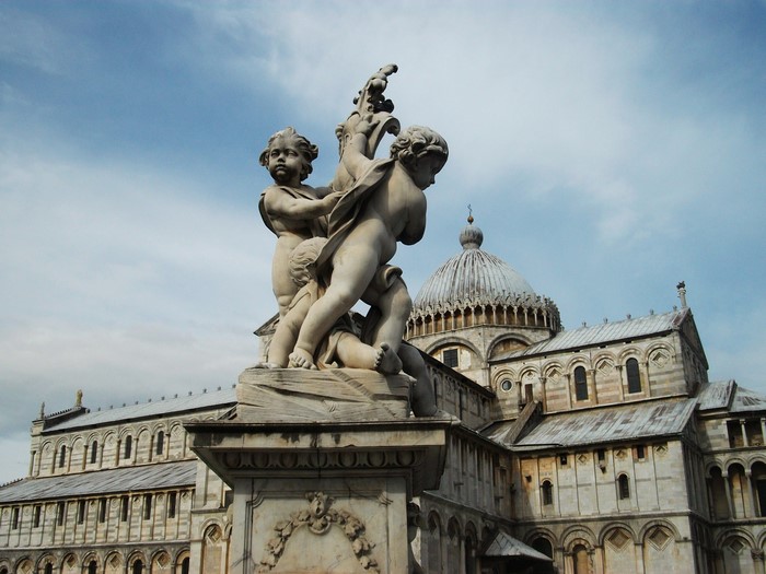 Sculpture of cherubs in front of Pisa Cathedral