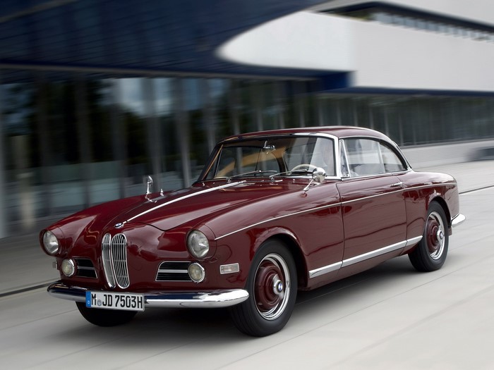Maroon BMW 3200 CS coupe driving