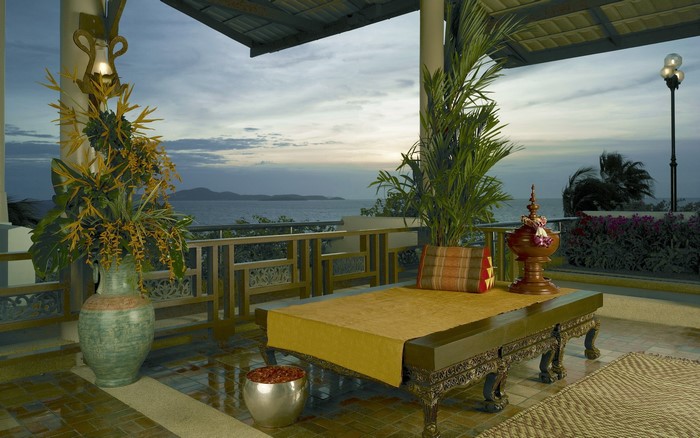 Balcony with ocean view and tropical plants