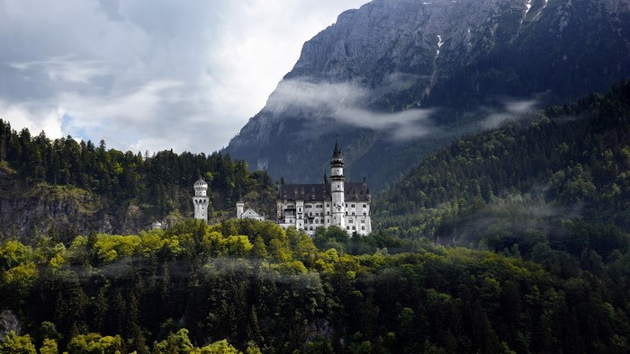 Neuschwanstein Castle in Germany with Mountains