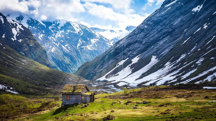 Wooden cabin in a Norwegian mountain valley