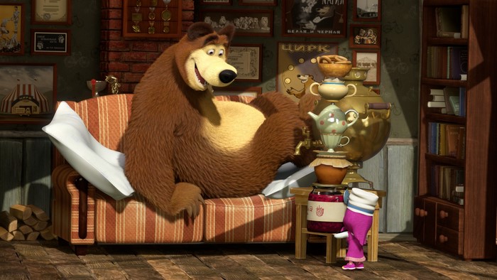 Bear from Masha and the Bear relaxing on a couch