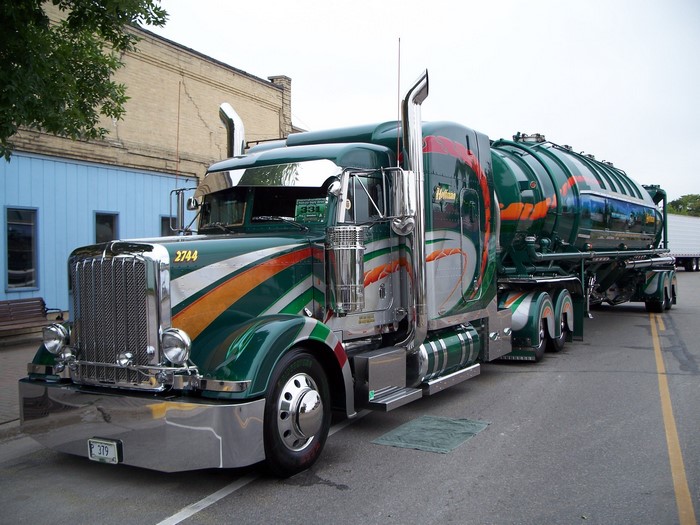 Custom Peterbilt 379 tanker truck with green and orange stripes