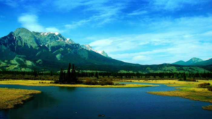 Mountain range with lake and marshland