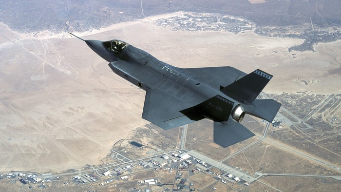 X-35 Fighter Jet Flying Over Desert Airfield