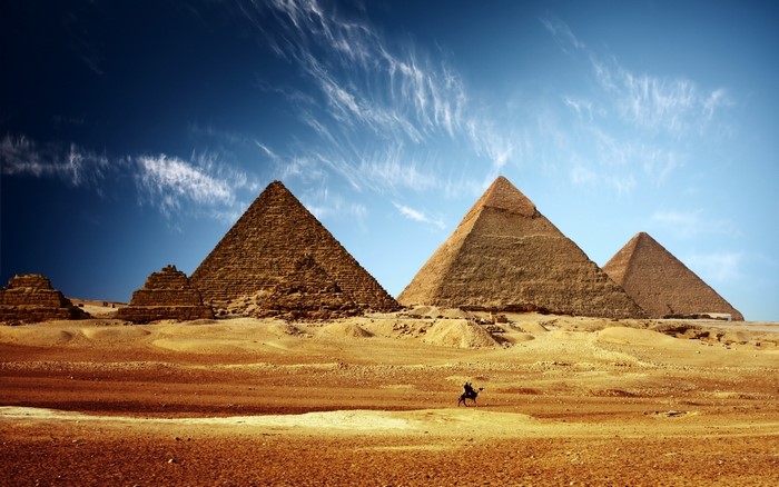 Pyramids of Giza, Egypt with a camel rider
