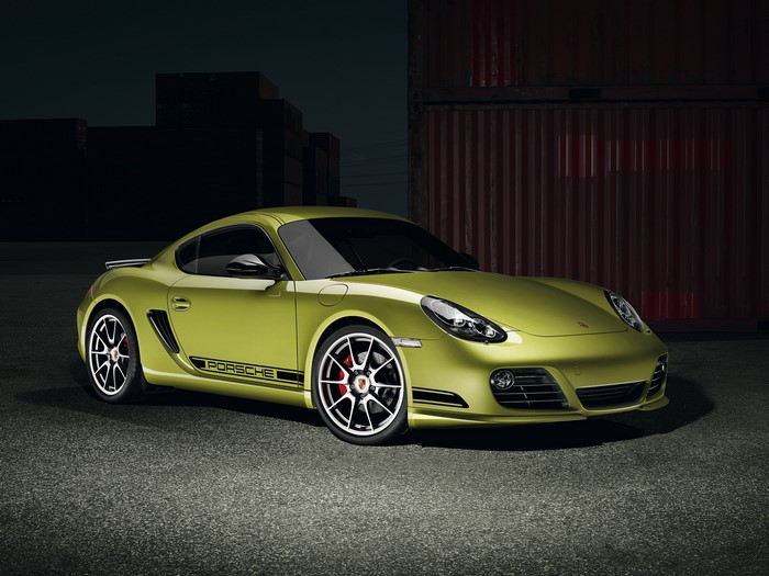 Yellow Porsche Cayman parked outdoors