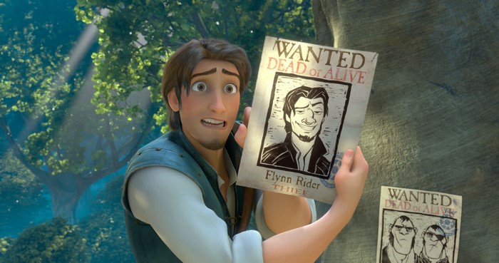 Flynn Rider from Tangled holding wanted posters