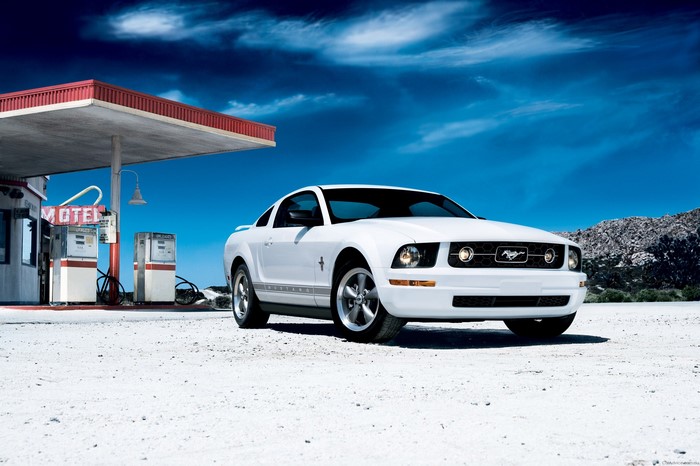 White Ford Mustang at a Desert Gas Station