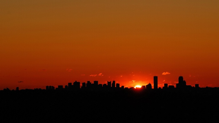 City skyline silhouette at sunset
