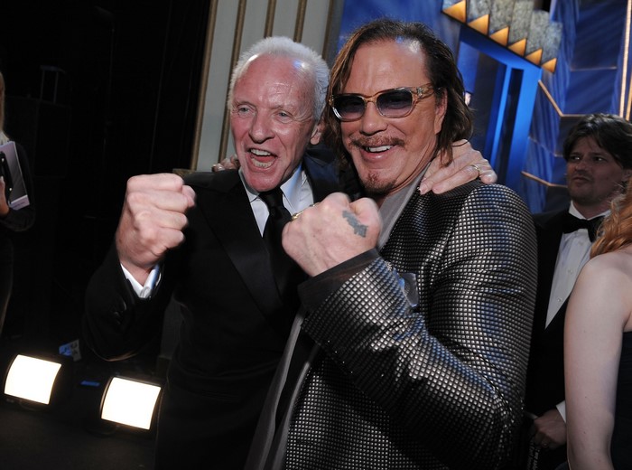 Mickey Rourke and Anthony Hopkins celebrating
