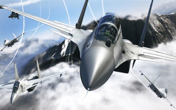 Fighter jets flying over mountains and clouds