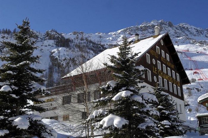 Hotel Le Chamois d'Or in snowy mountains