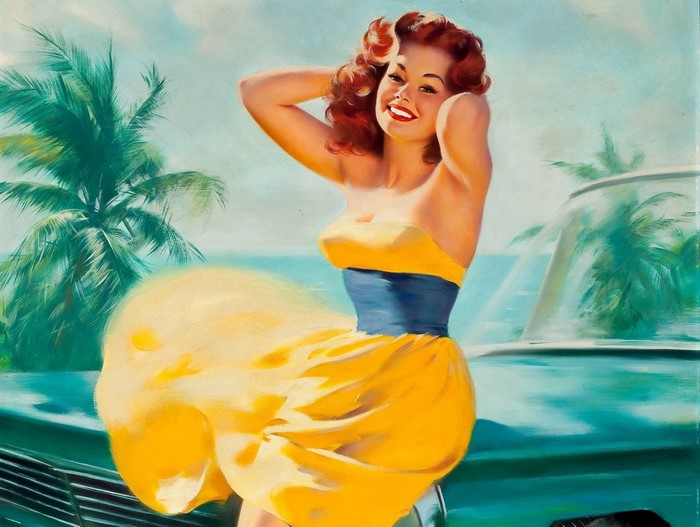 Woman in yellow dress by a car