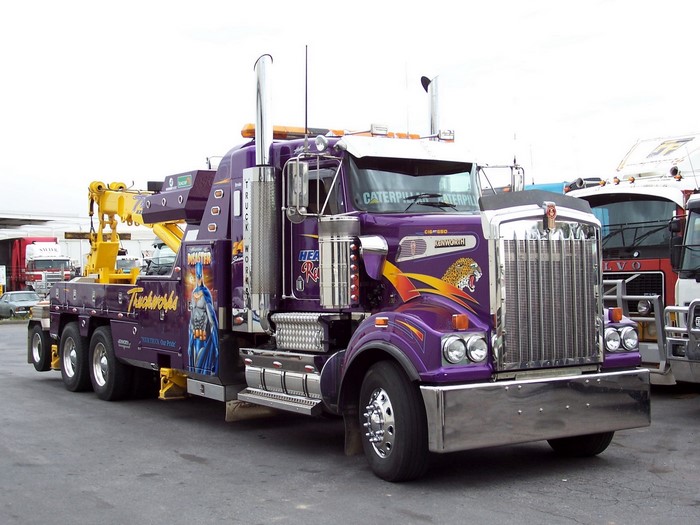 Purple Kenworth Tow Truck with Batman Graphic