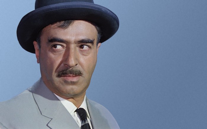 Man in a hat and suit