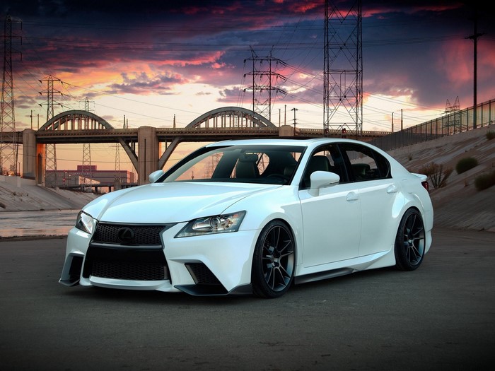 White Lexus GS F Sport sedan on asphalt