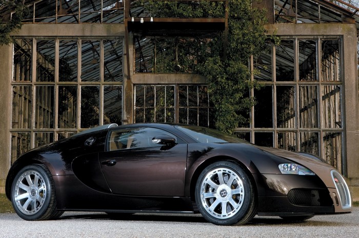 Bugatti Veyron in front of an abandoned greenhouse