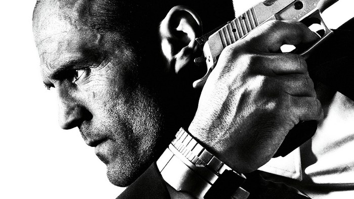 Frank Martin from The Transporter with a gun