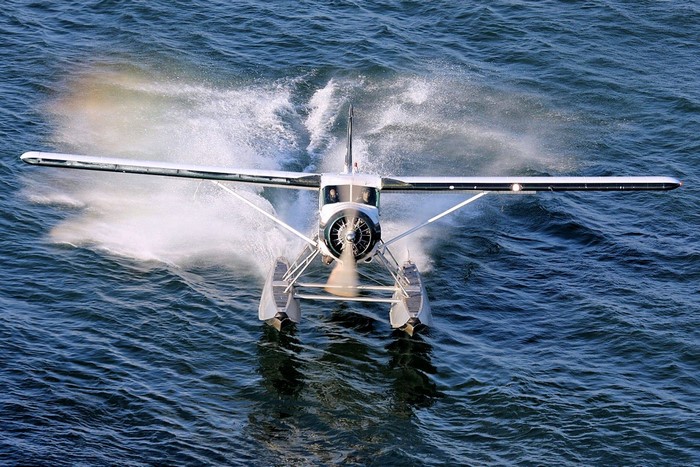 Seaplane taking off from water