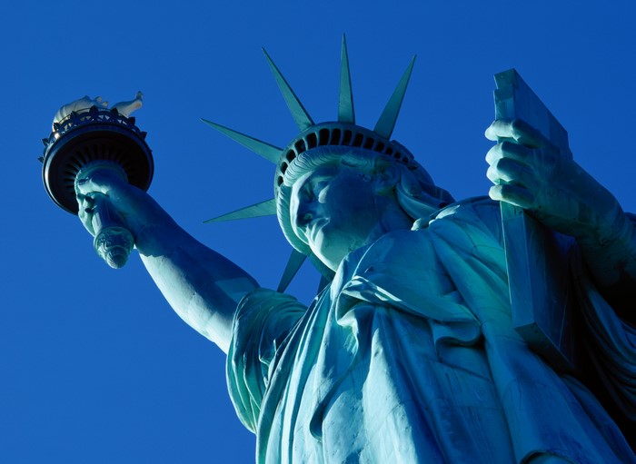 Statue of Liberty against a clear blue sky