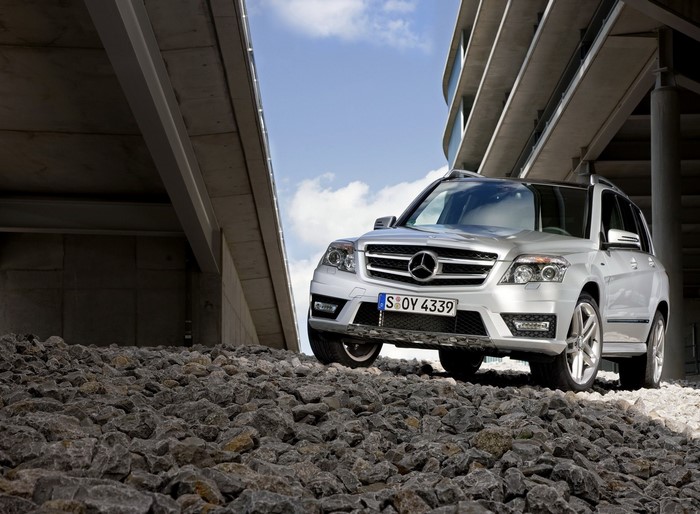 Silver Mercedes-Benz GLK parked on gravel