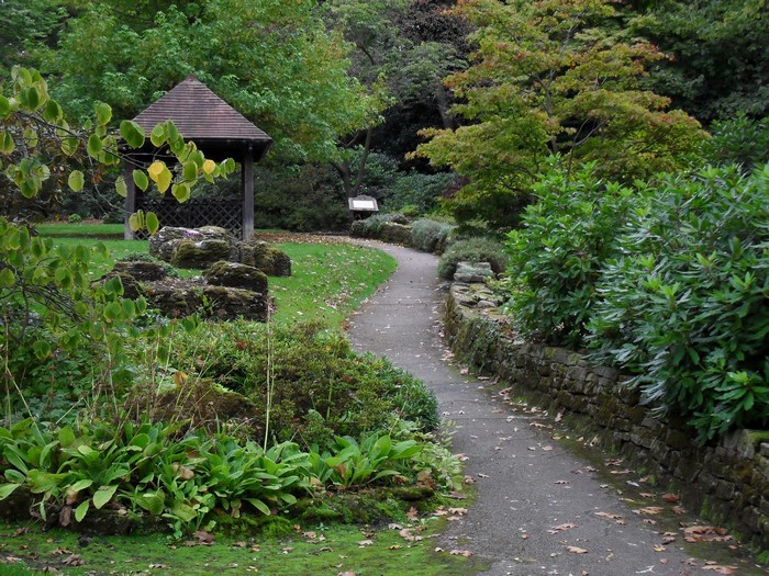 Park with a gazebo and stone wall