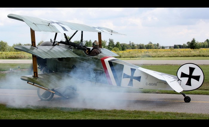 Fokker Dr.I triplane aircraft with pilot