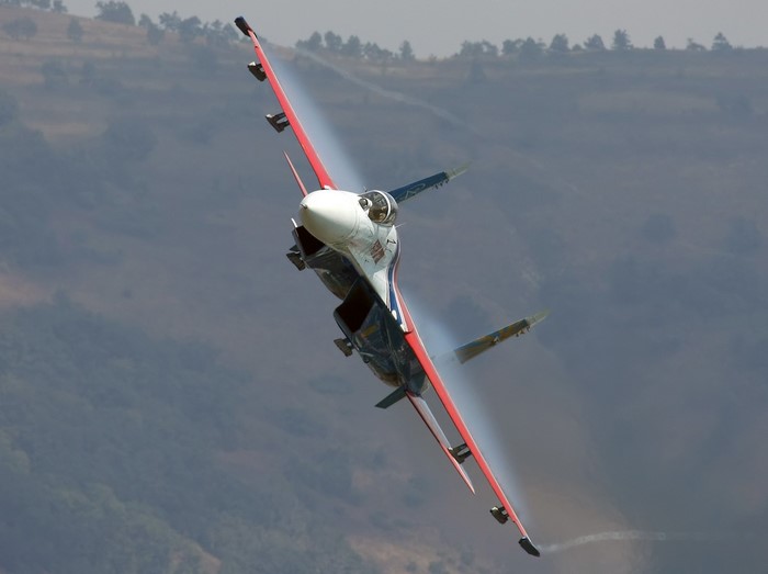 Sukhoi Su-27 fighter jet performing aerobatics