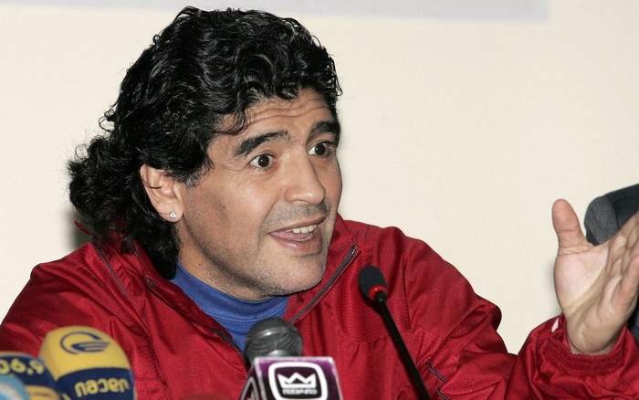 Diego Maradona speaking at a press conference
