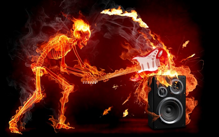 Skeleton playing guitar on fire with speaker