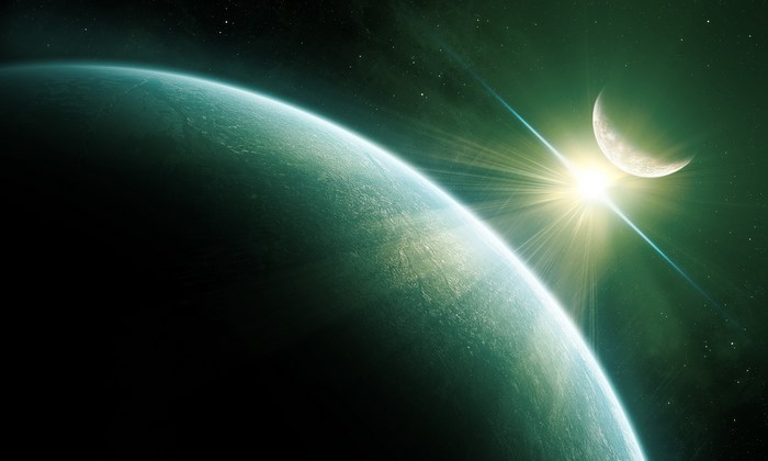 Planet and Moon with Sunburst in Space