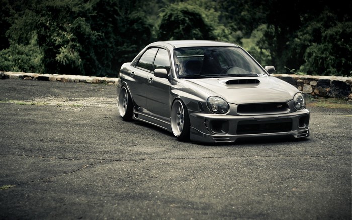 Silver Subaru Impreza WRX STI parked on asphalt