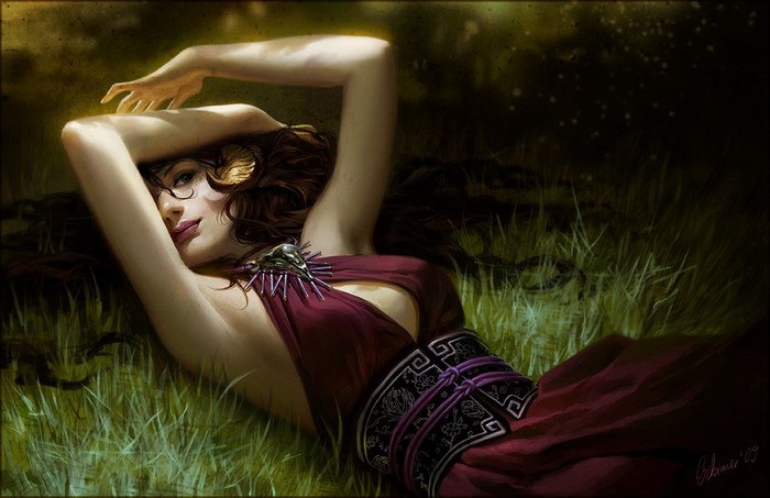 Woman with horns lying in grass
