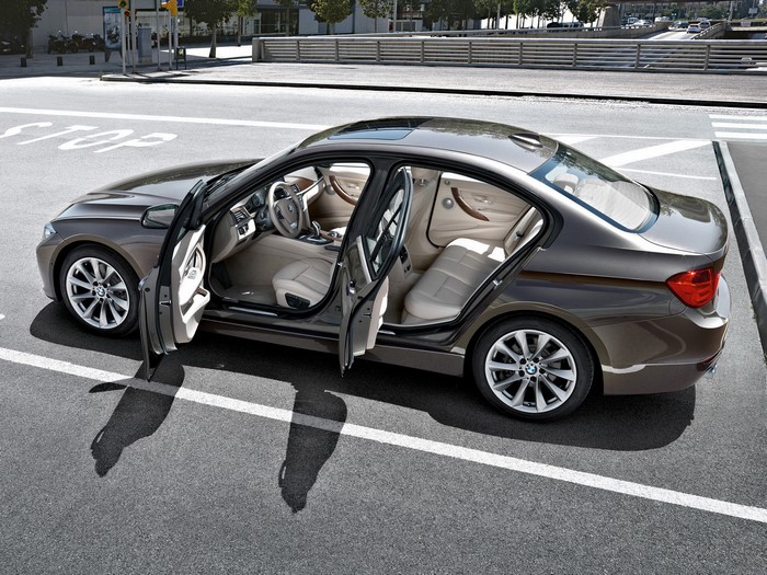 Brown BMW Sedan with Doors Open