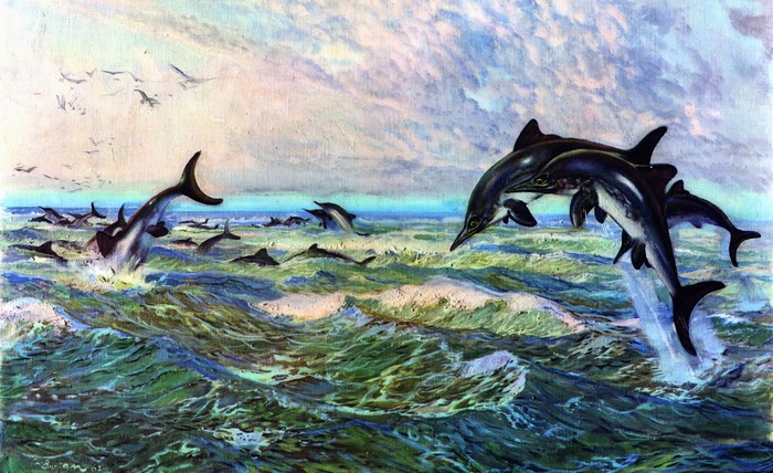 Dolphins leaping from the ocean waves