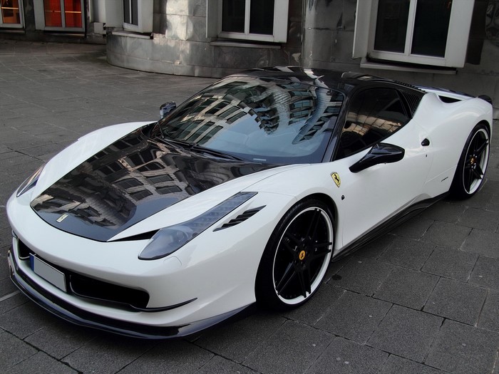 White Ferrari with black hood and roof