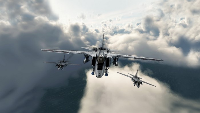 Three fighter jets flying through clouds
