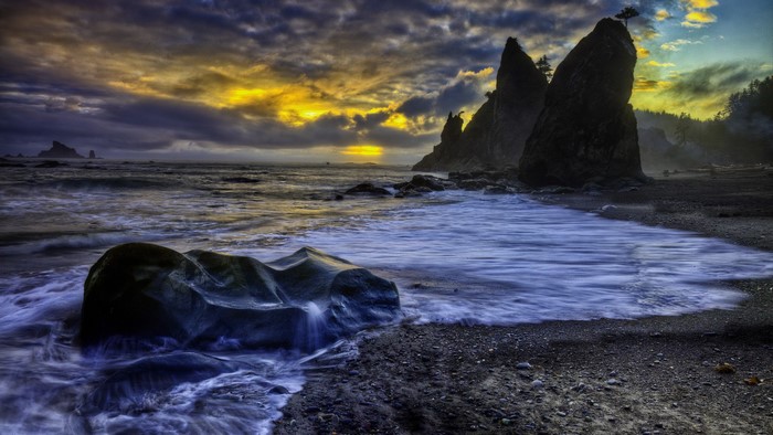 Dramatic Sunset over Rocky Coastline