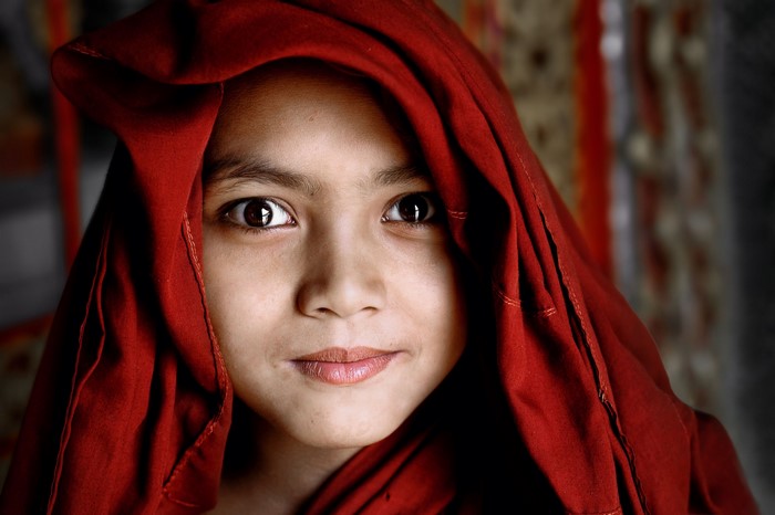 Girl wearing a red headscarf