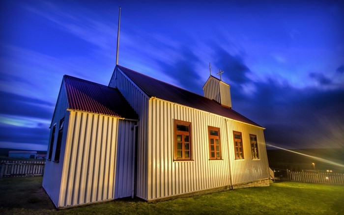 Church at dusk with dramatic sky