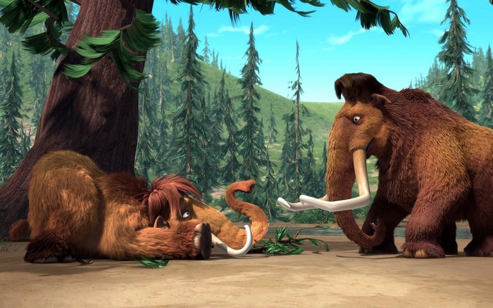 Two mammoths in a forest