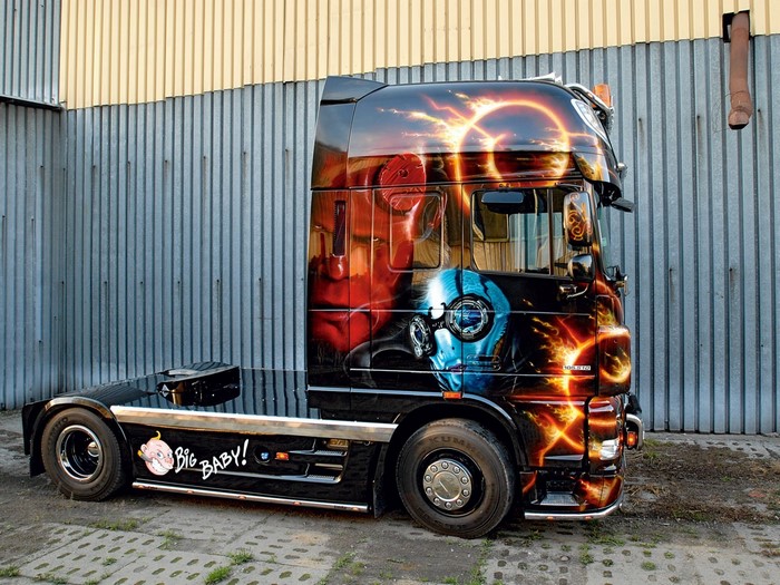 Custom painted truck with fire and eclipse art