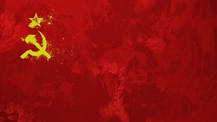 Hammer and sickle on red background
