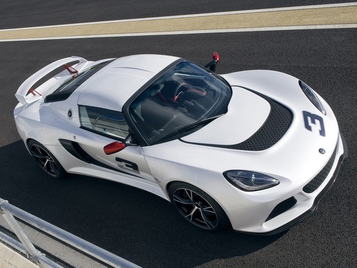 White Lotus race car with number 3 on a track