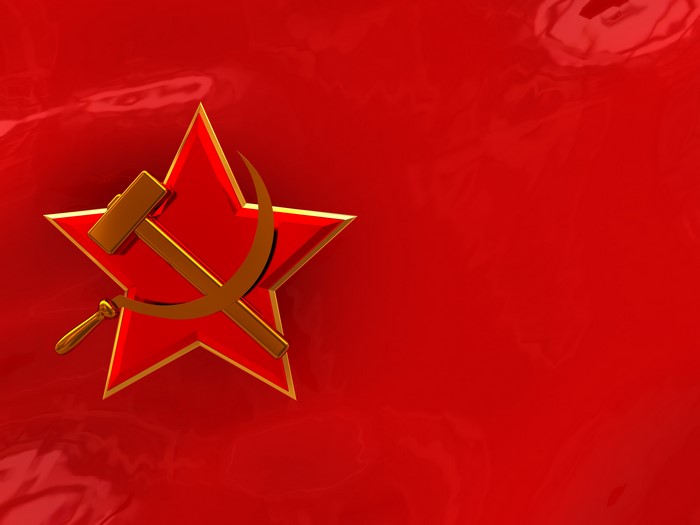 Hammer and sickle on red background